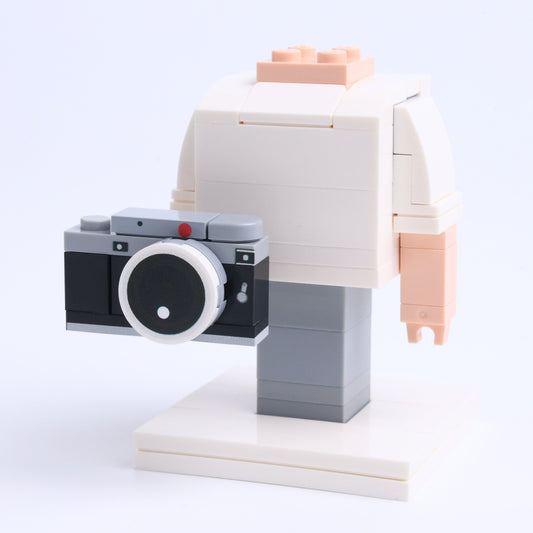 Camera brick figure accessory, right-side view