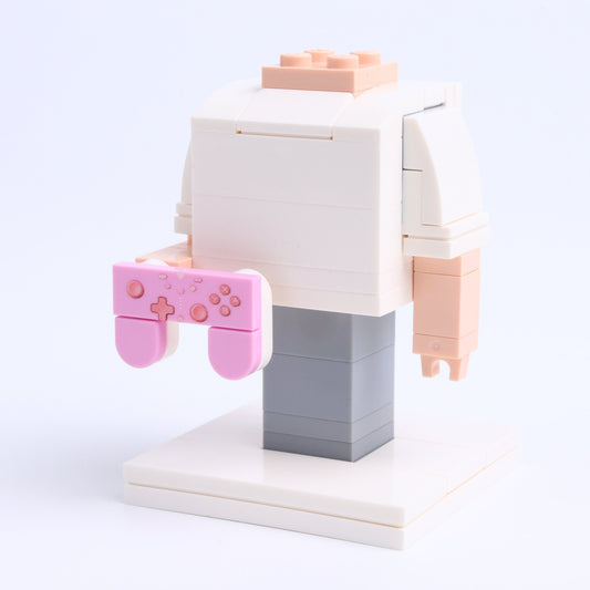 Pink Game Controller brick figure accessory, right-side view