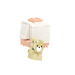 Tan Bear brick figure accessory, left-side view